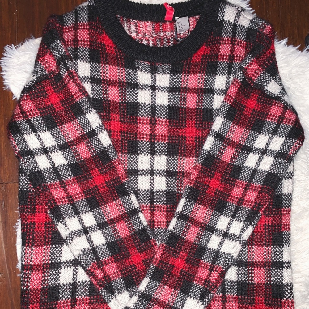large red and black plaid sweater